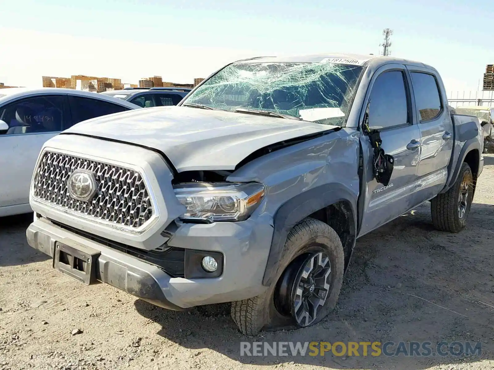 2 Photograph of a damaged car 3TMCZ5AN3KM282676 TOYOTA TACOMA DOU 2019