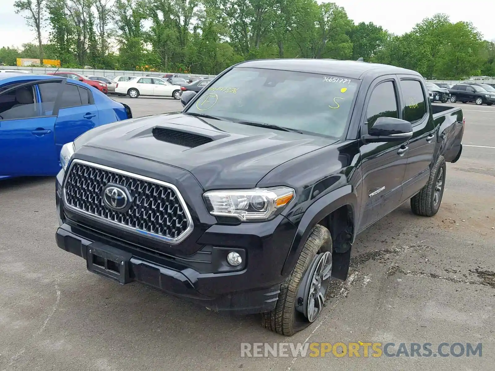 2 Photograph of a damaged car 3TMCZ5AN4KM197376 TOYOTA TACOMA DOU 2019