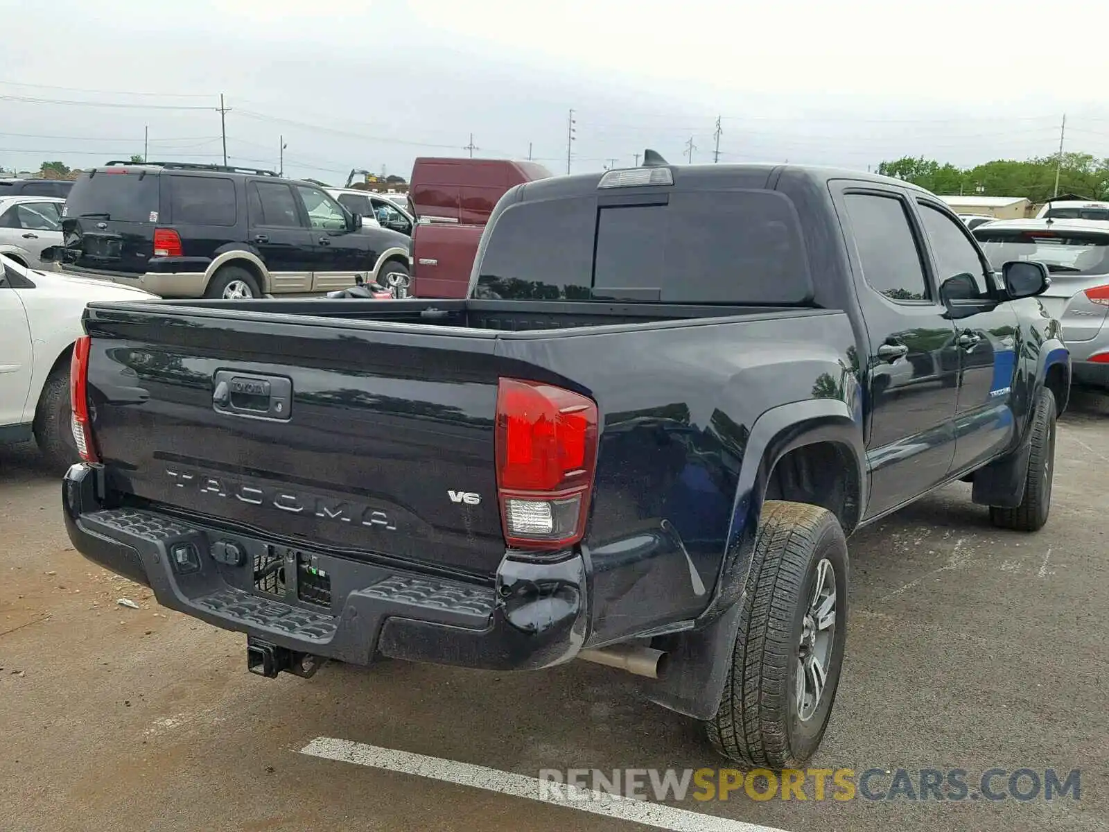 4 Photograph of a damaged car 3TMCZ5AN4KM197376 TOYOTA TACOMA DOU 2019