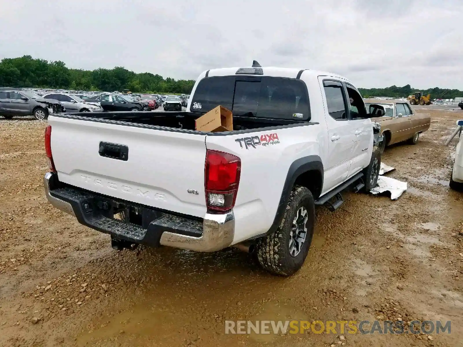 4 Photograph of a damaged car 3TMCZ5AN4KM202916 TOYOTA TACOMA DOU 2019