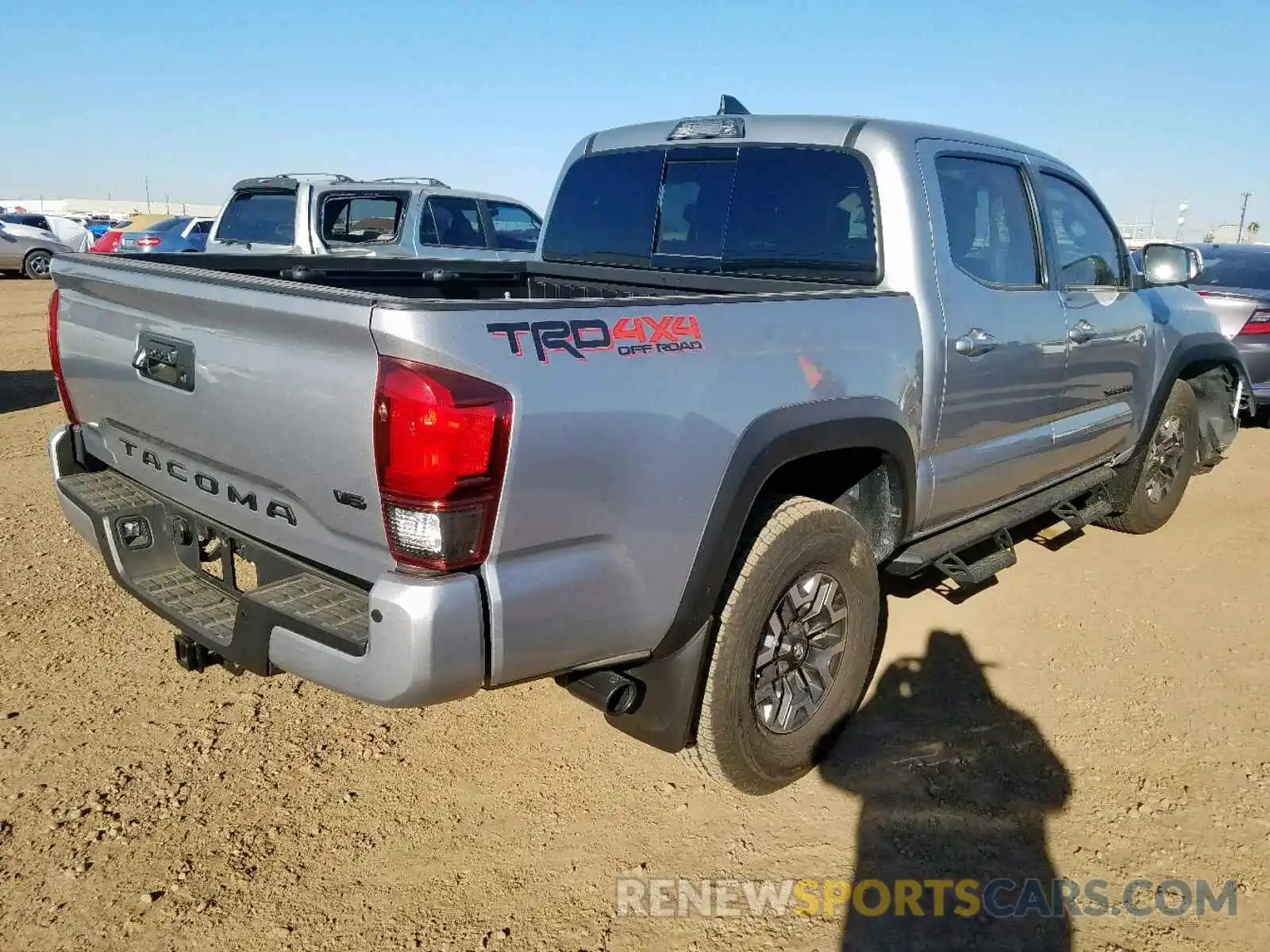 4 Photograph of a damaged car 3TMCZ5AN4KM215911 TOYOTA TACOMA DOU 2019