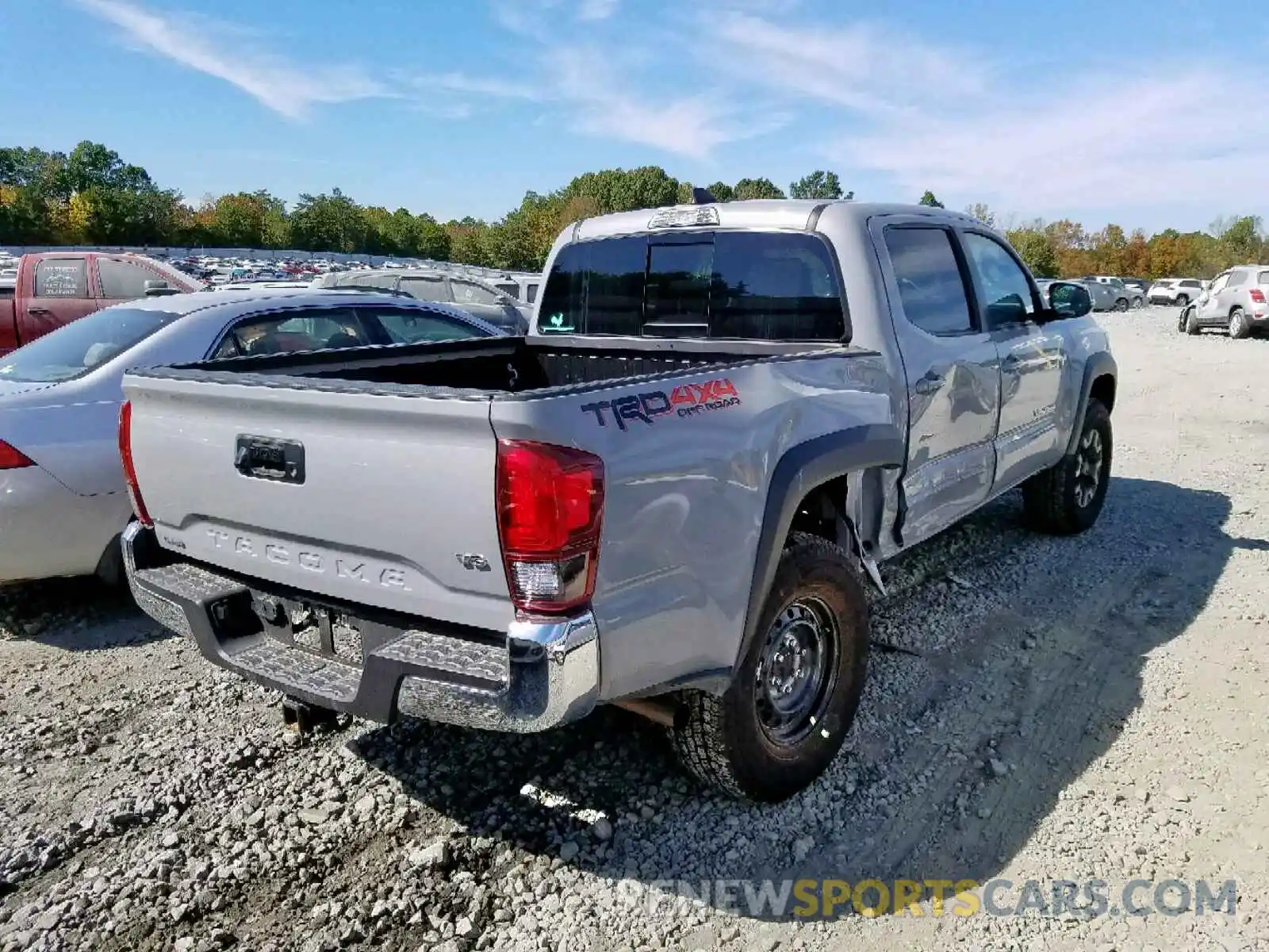 4 Photograph of a damaged car 3TMCZ5AN4KM228450 TOYOTA TACOMA DOU 2019