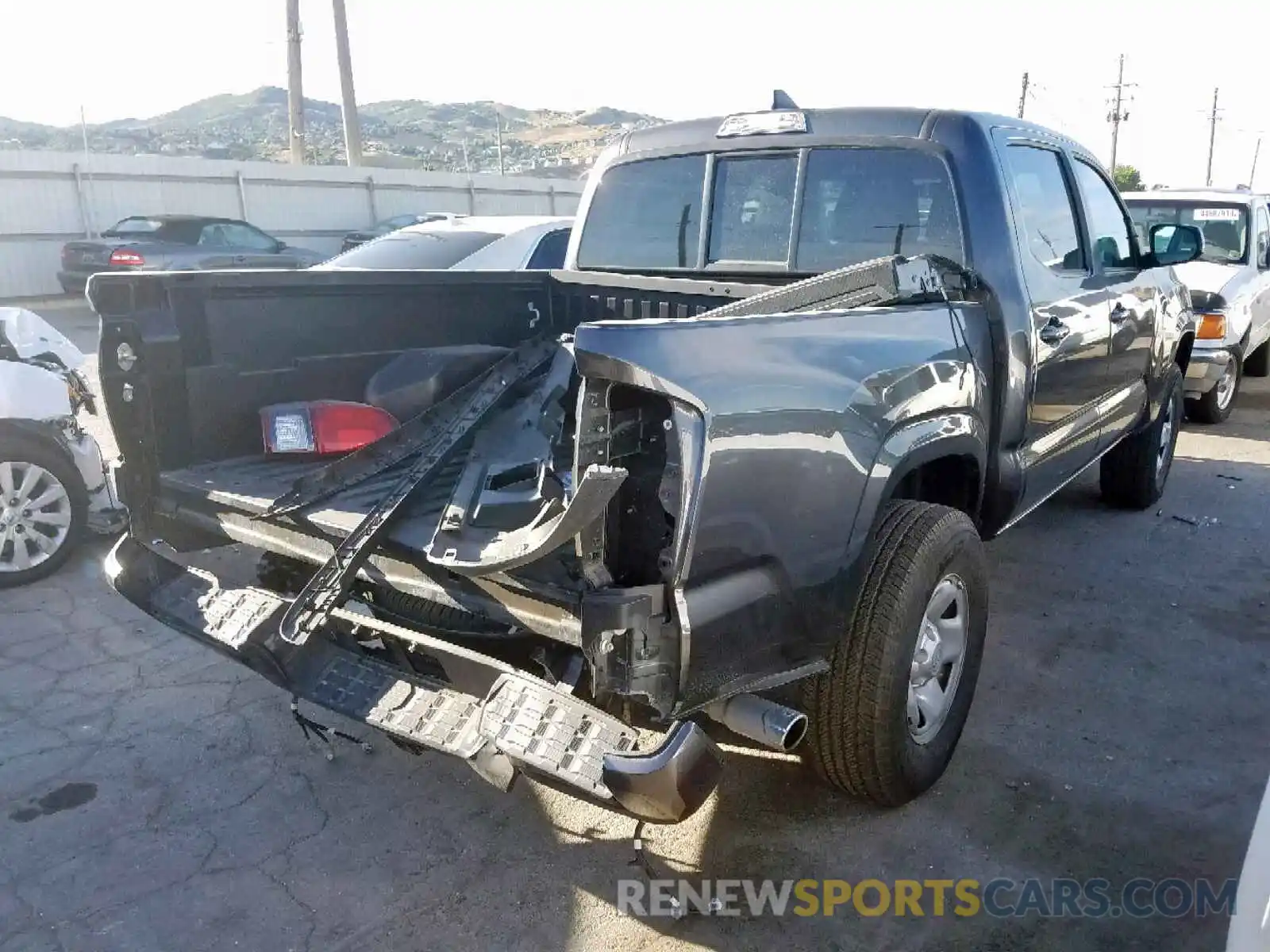 4 Photograph of a damaged car 3TMCZ5AN5KM217960 TOYOTA TACOMA DOU 2019