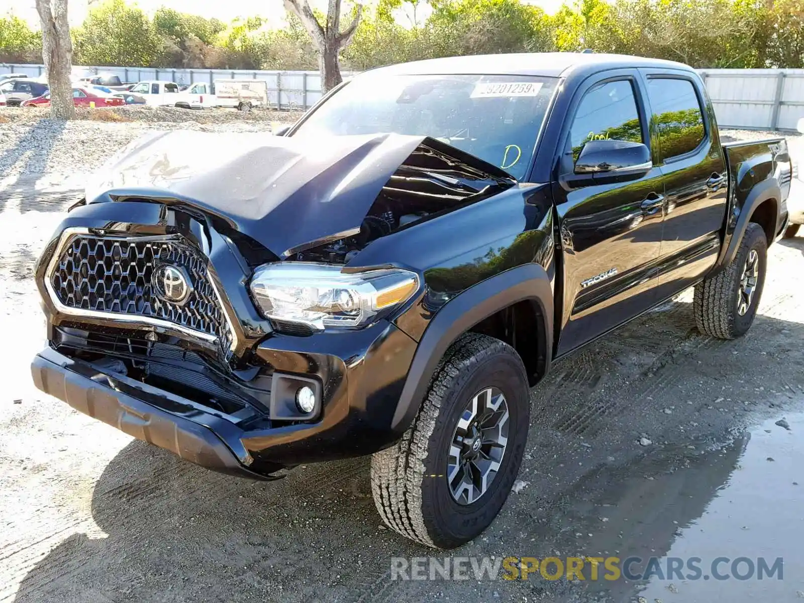 2 Photograph of a damaged car 3TMCZ5AN5KM219112 TOYOTA TACOMA DOU 2019