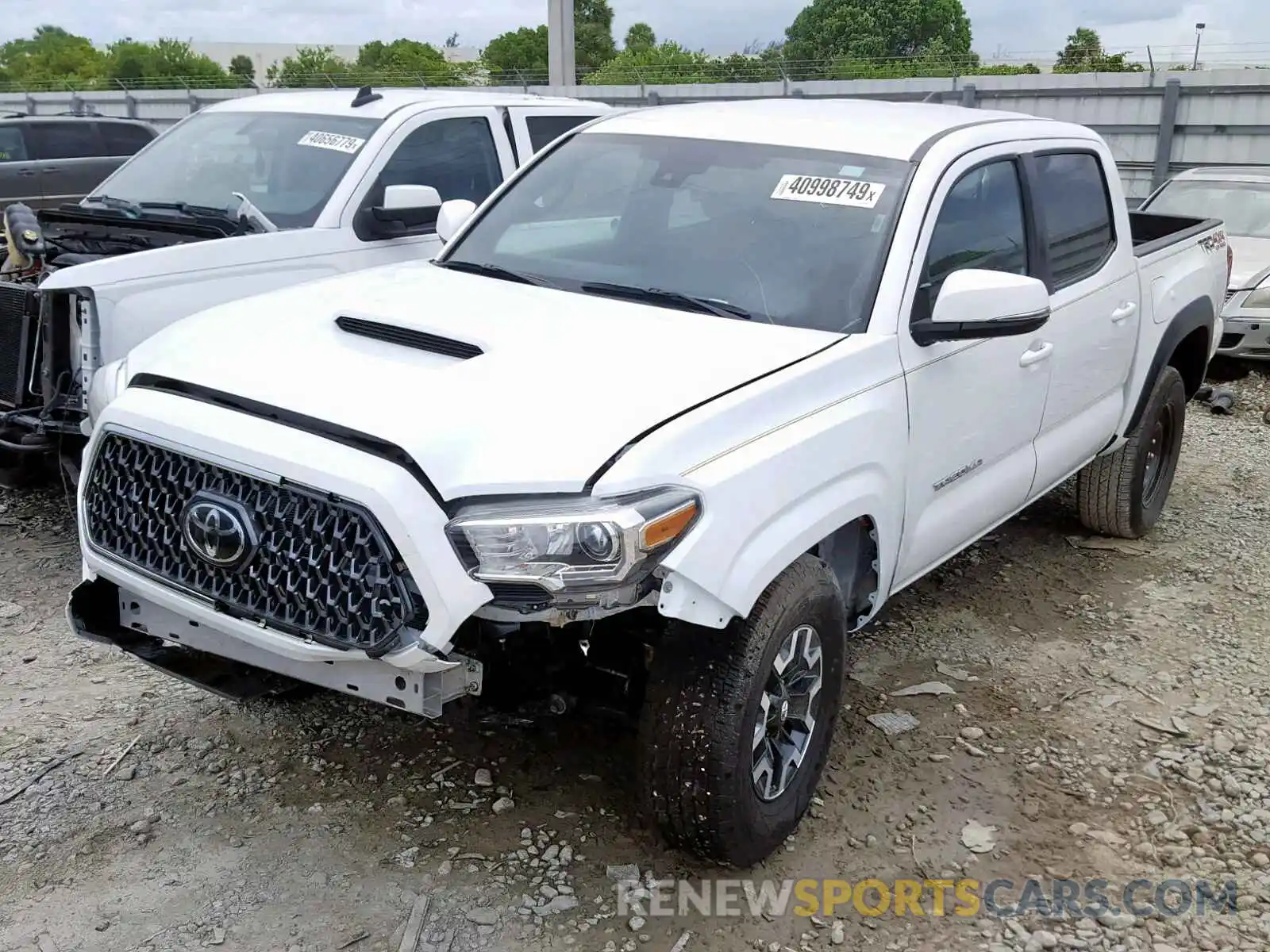 2 Photograph of a damaged car 3TMCZ5AN5KM223452 TOYOTA TACOMA DOU 2019