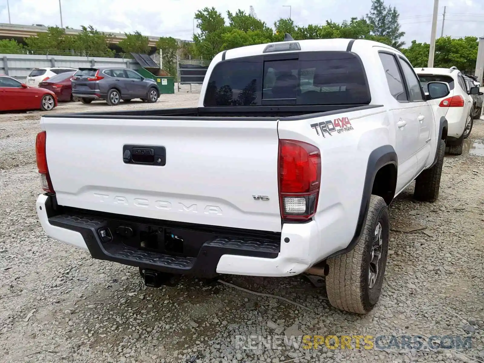 4 Photograph of a damaged car 3TMCZ5AN5KM223452 TOYOTA TACOMA DOU 2019