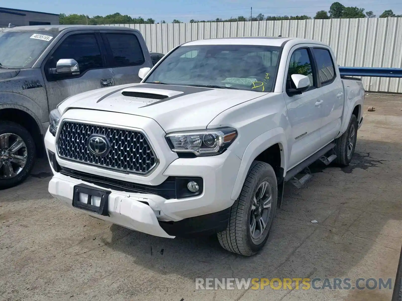 2 Photograph of a damaged car 3TMCZ5AN5KM232880 TOYOTA TACOMA DOU 2019