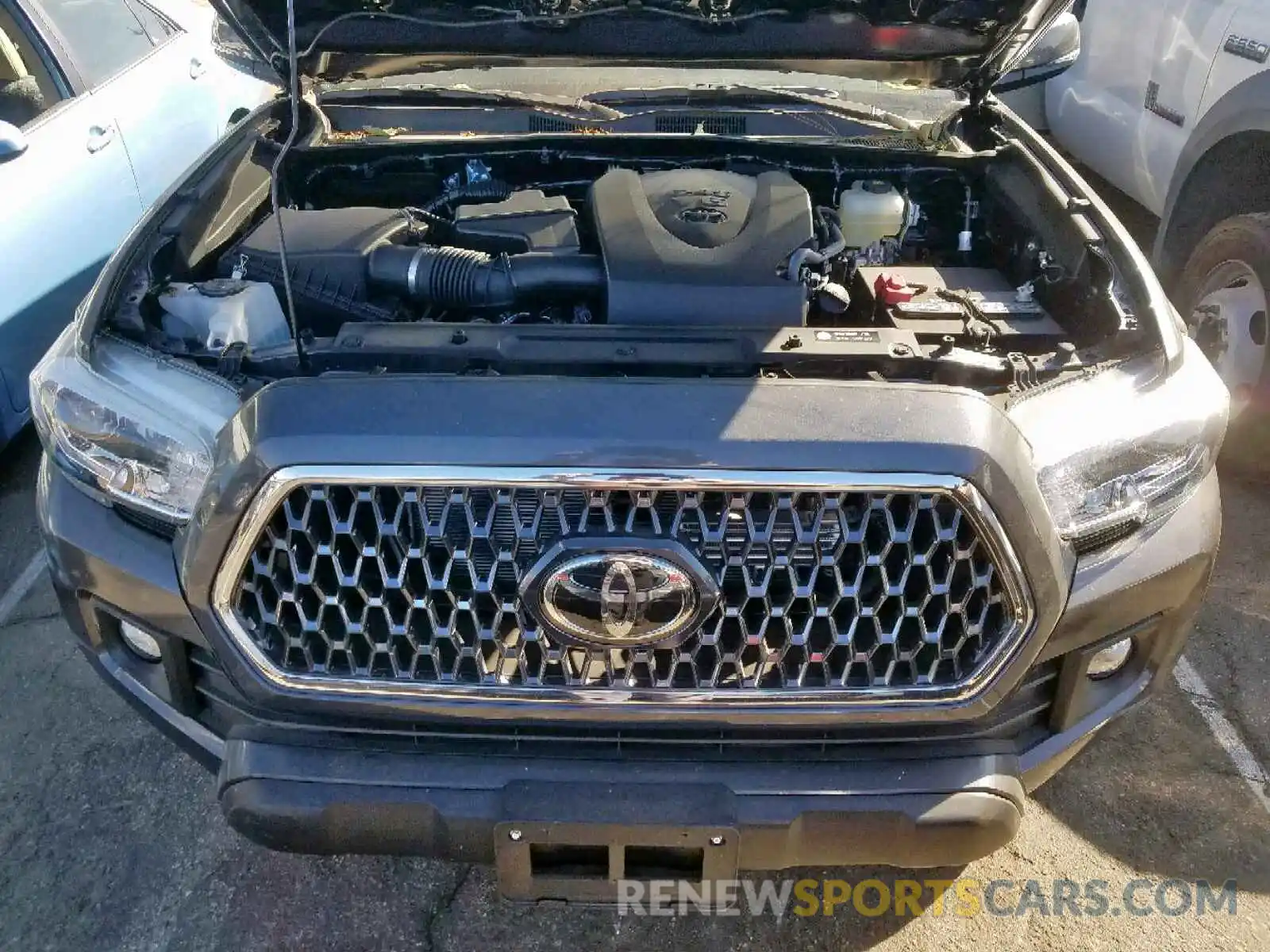 7 Photograph of a damaged car 3TMCZ5AN5KM281643 TOYOTA TACOMA DOU 2019