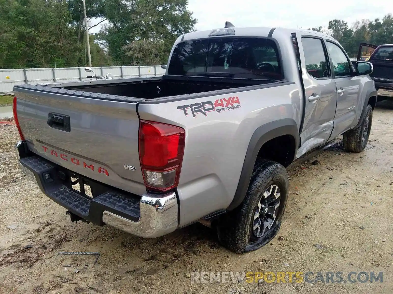 4 Photograph of a damaged car 3TMCZ5AN6KM190123 TOYOTA TACOMA DOU 2019