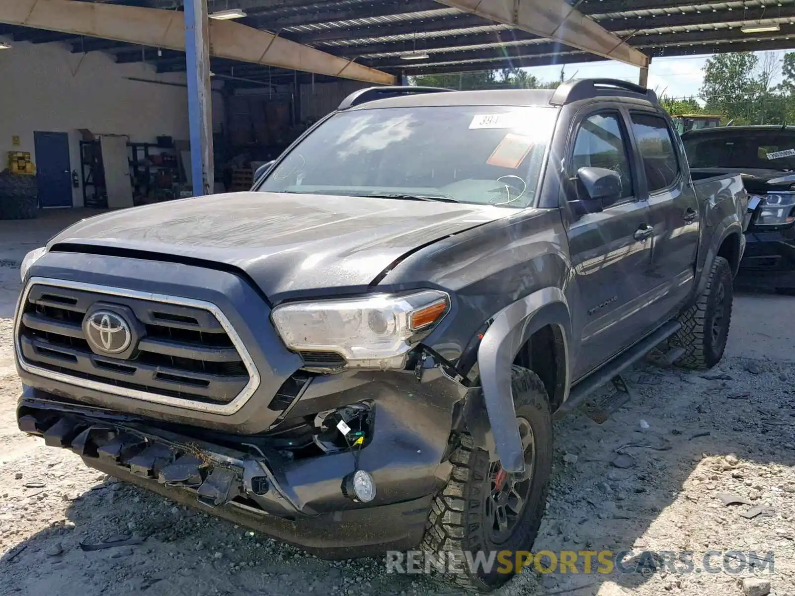 2 Photograph of a damaged car 3TMCZ5AN6KM192468 TOYOTA TACOMA DOU 2019