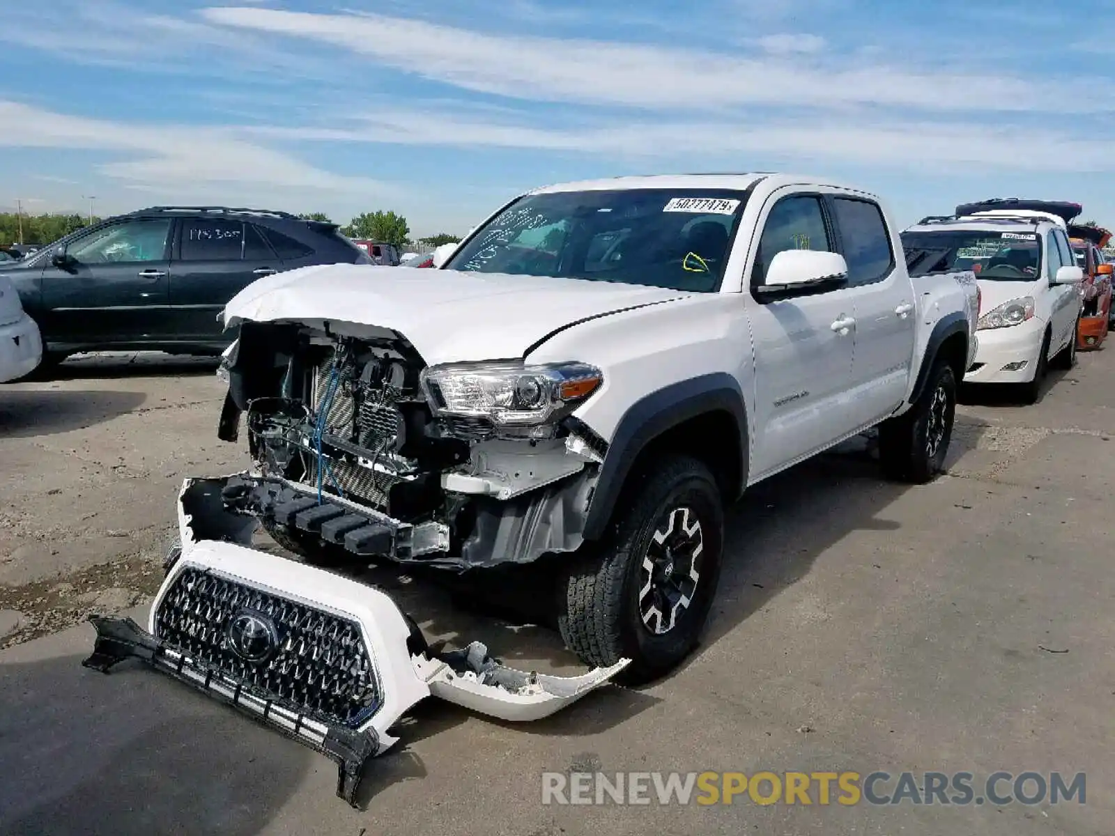 2 Photograph of a damaged car 3TMCZ5AN6KM198111 TOYOTA TACOMA DOU 2019