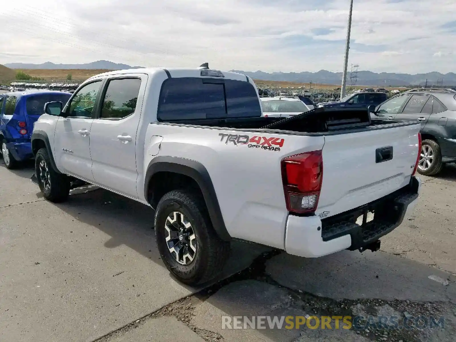 3 Photograph of a damaged car 3TMCZ5AN6KM198111 TOYOTA TACOMA DOU 2019