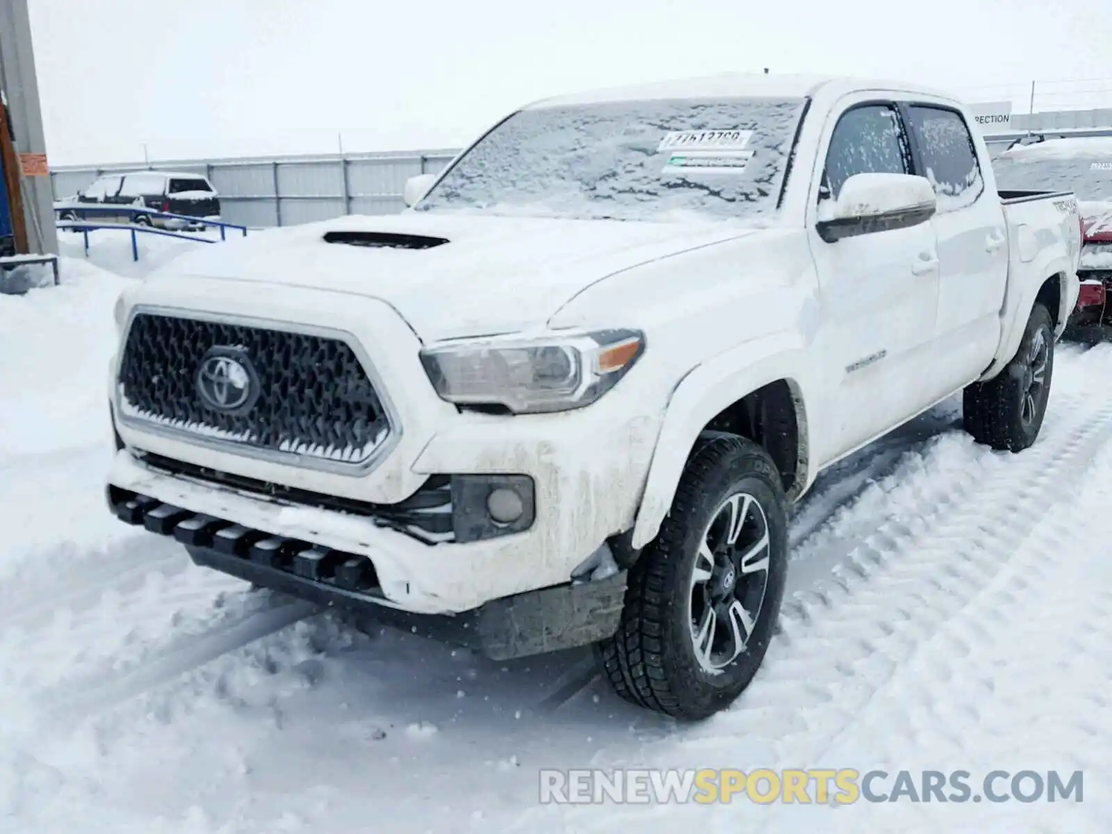 2 Photograph of a damaged car 3TMCZ5AN6KM209477 TOYOTA TACOMA DOU 2019