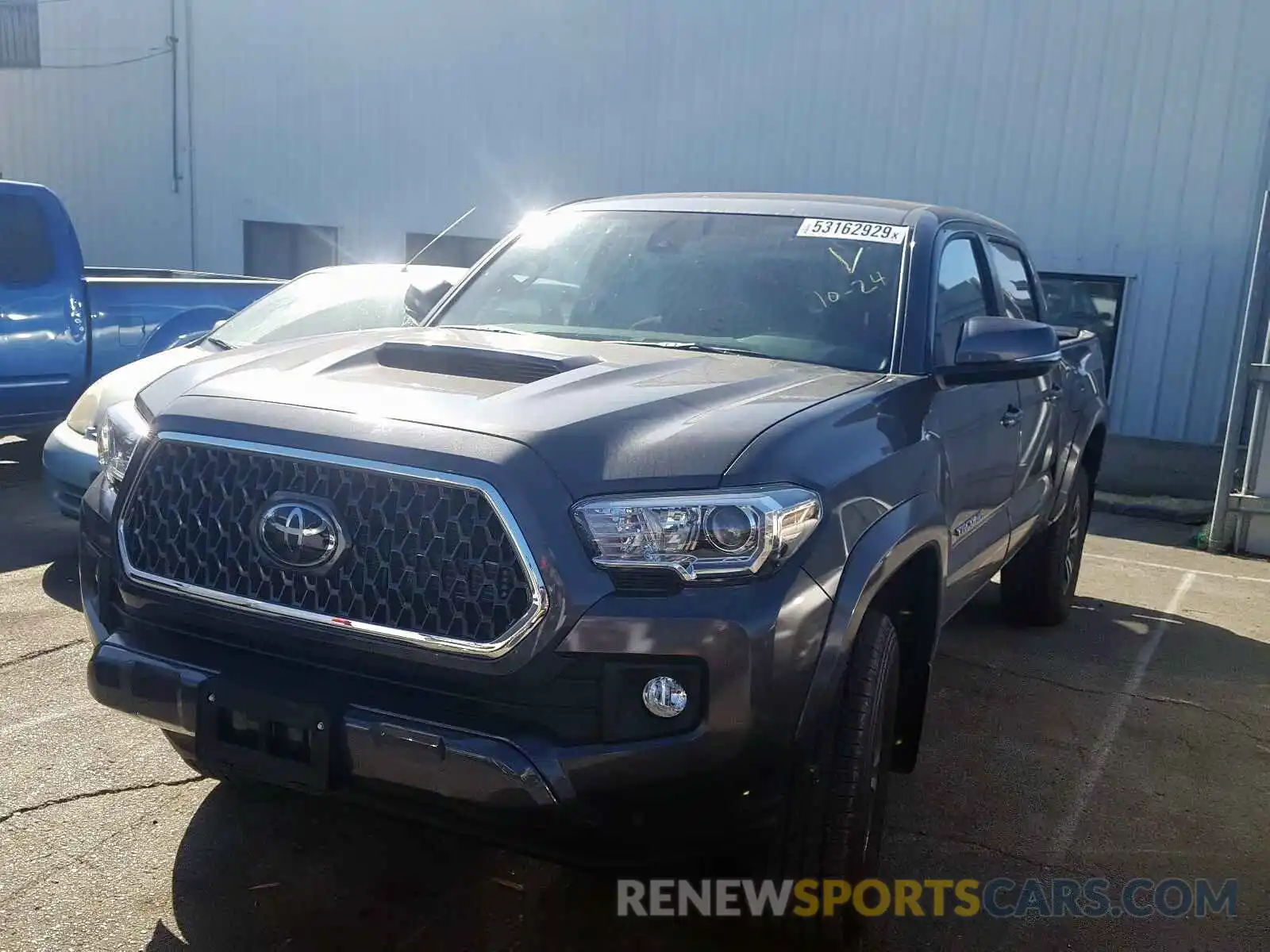 2 Photograph of a damaged car 3TMCZ5AN6KM277634 TOYOTA TACOMA DOU 2019