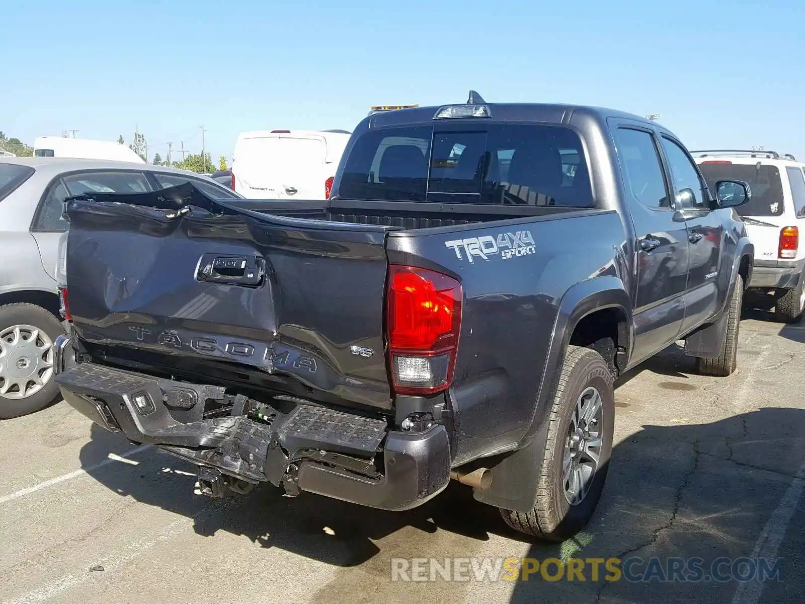 4 Photograph of a damaged car 3TMCZ5AN6KM277634 TOYOTA TACOMA DOU 2019