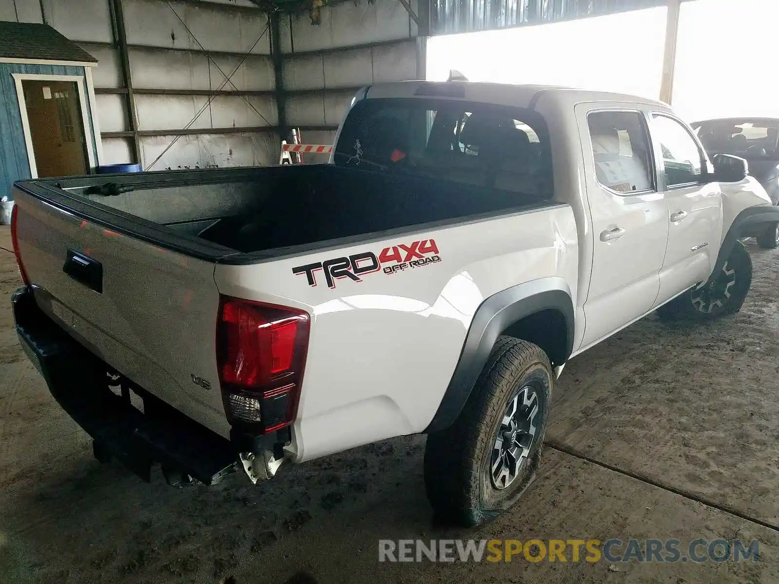 4 Photograph of a damaged car 3TMCZ5AN7KM203977 TOYOTA TACOMA DOU 2019