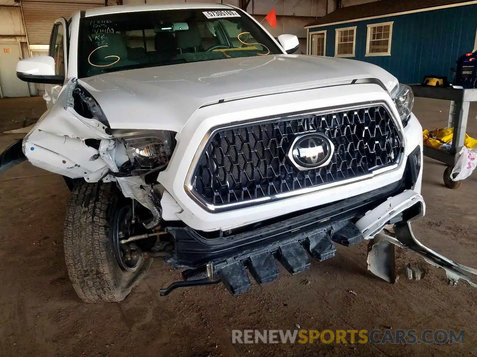 9 Photograph of a damaged car 3TMCZ5AN7KM203977 TOYOTA TACOMA DOU 2019