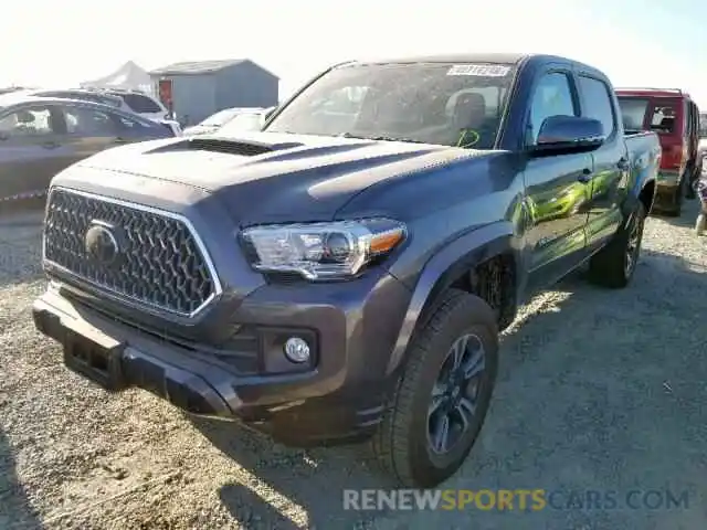 2 Photograph of a damaged car 3TMCZ5AN7KM244125 TOYOTA TACOMA DOU 2019