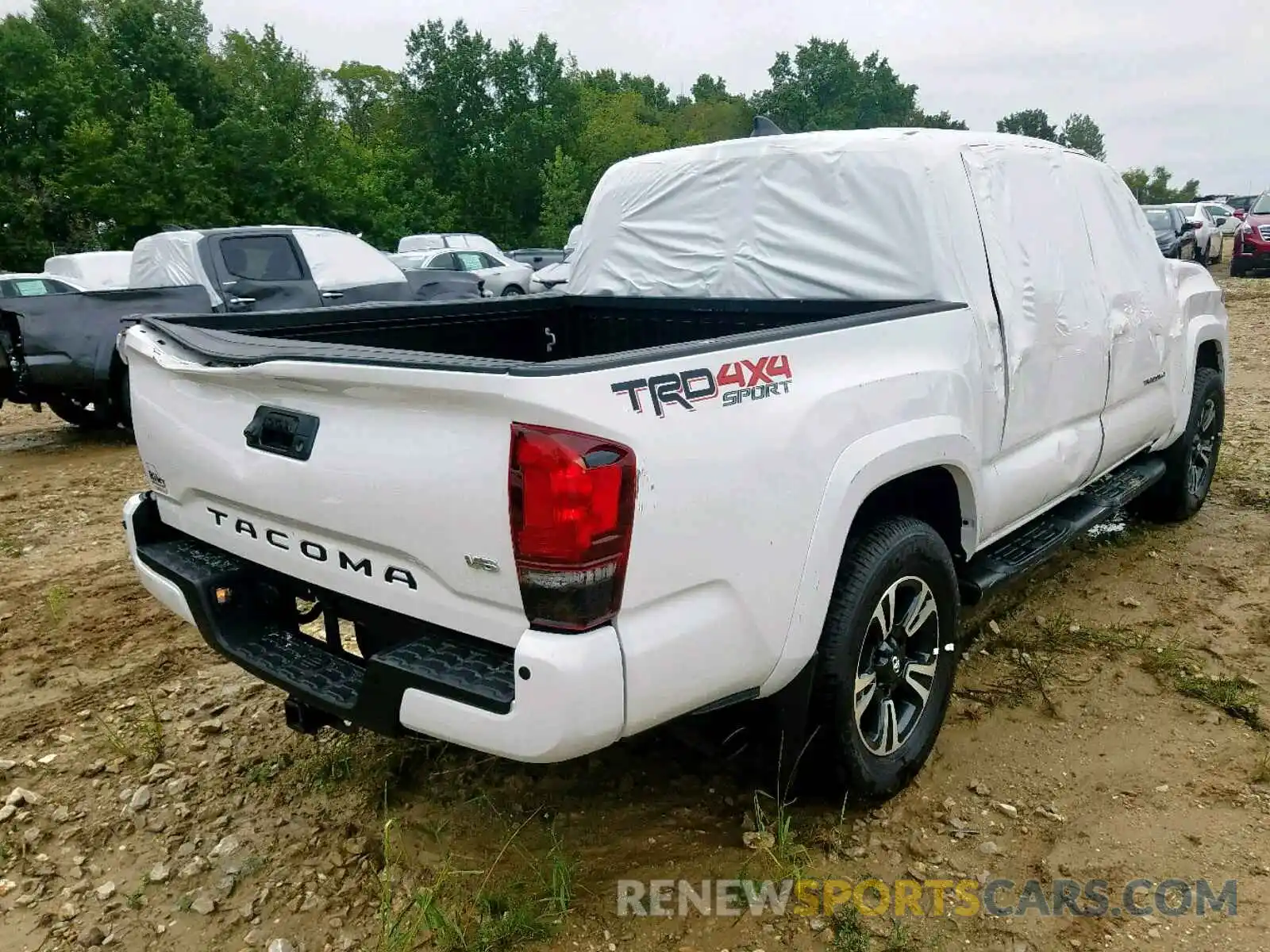 4 Photograph of a damaged car 3TMCZ5AN8KM193069 TOYOTA TACOMA DOU 2019