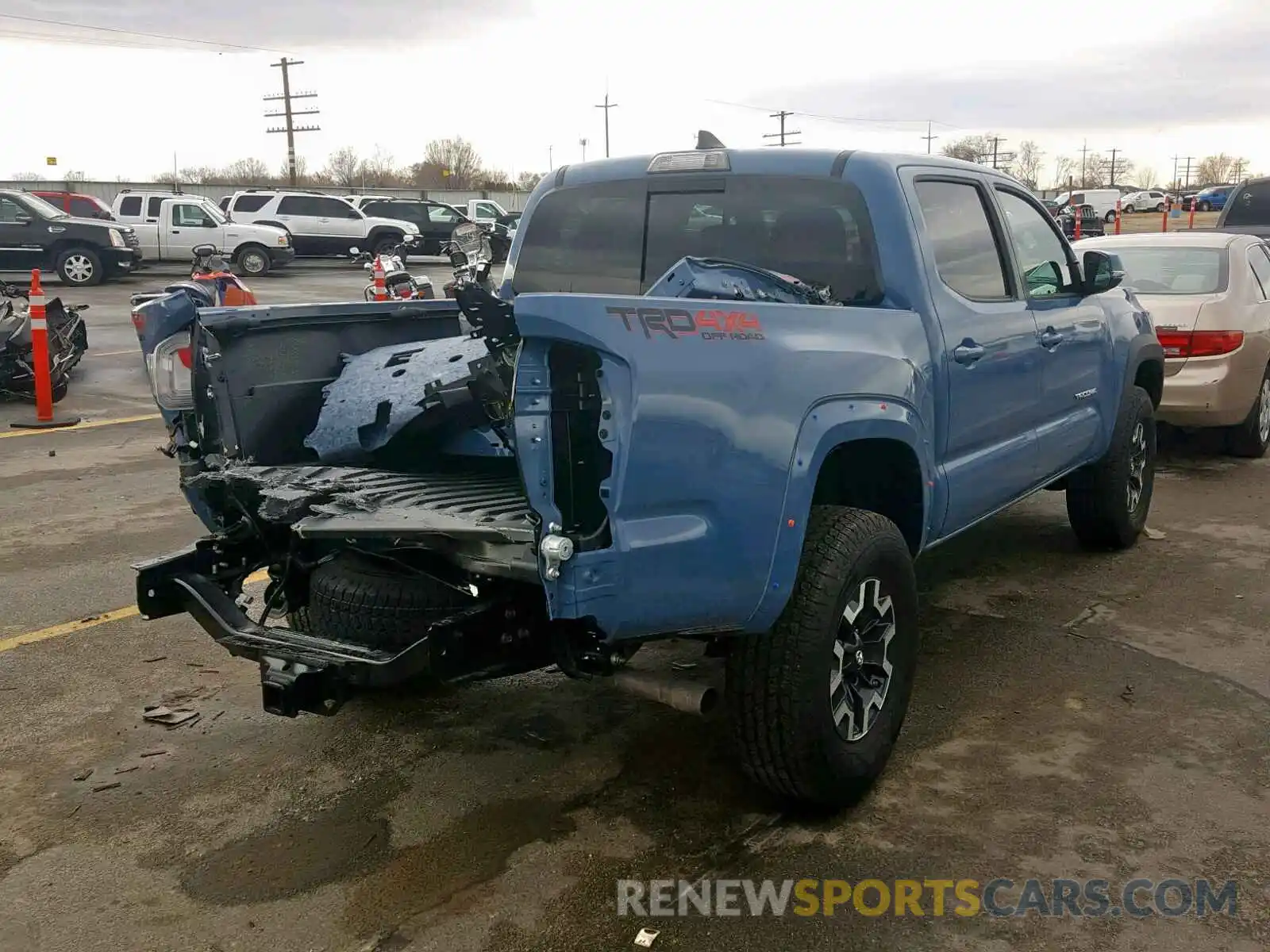 4 Photograph of a damaged car 3TMCZ5AN8KM203907 TOYOTA TACOMA DOU 2019