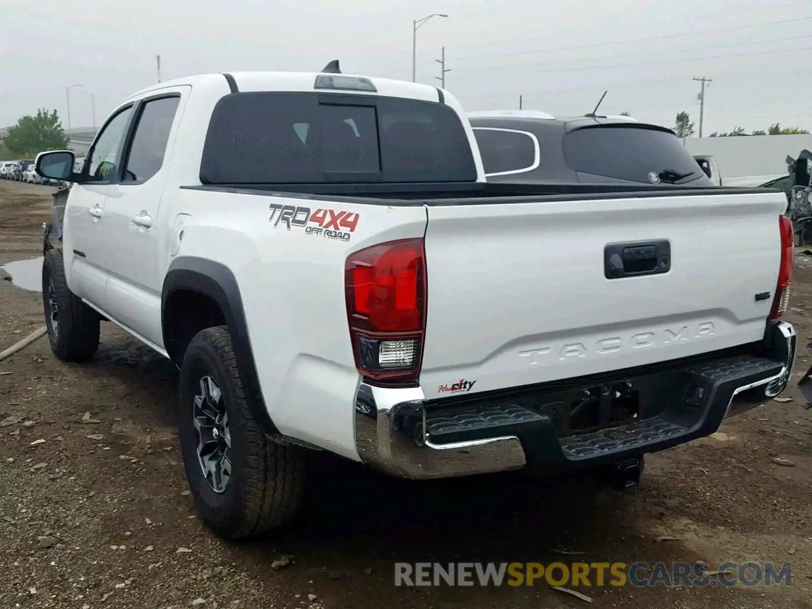 3 Photograph of a damaged car 3TMCZ5AN8KM208296 TOYOTA TACOMA DOU 2019