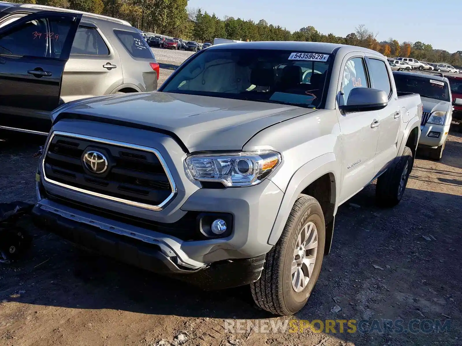 2 Photograph of a damaged car 3TMCZ5AN8KM268837 TOYOTA TACOMA DOU 2019