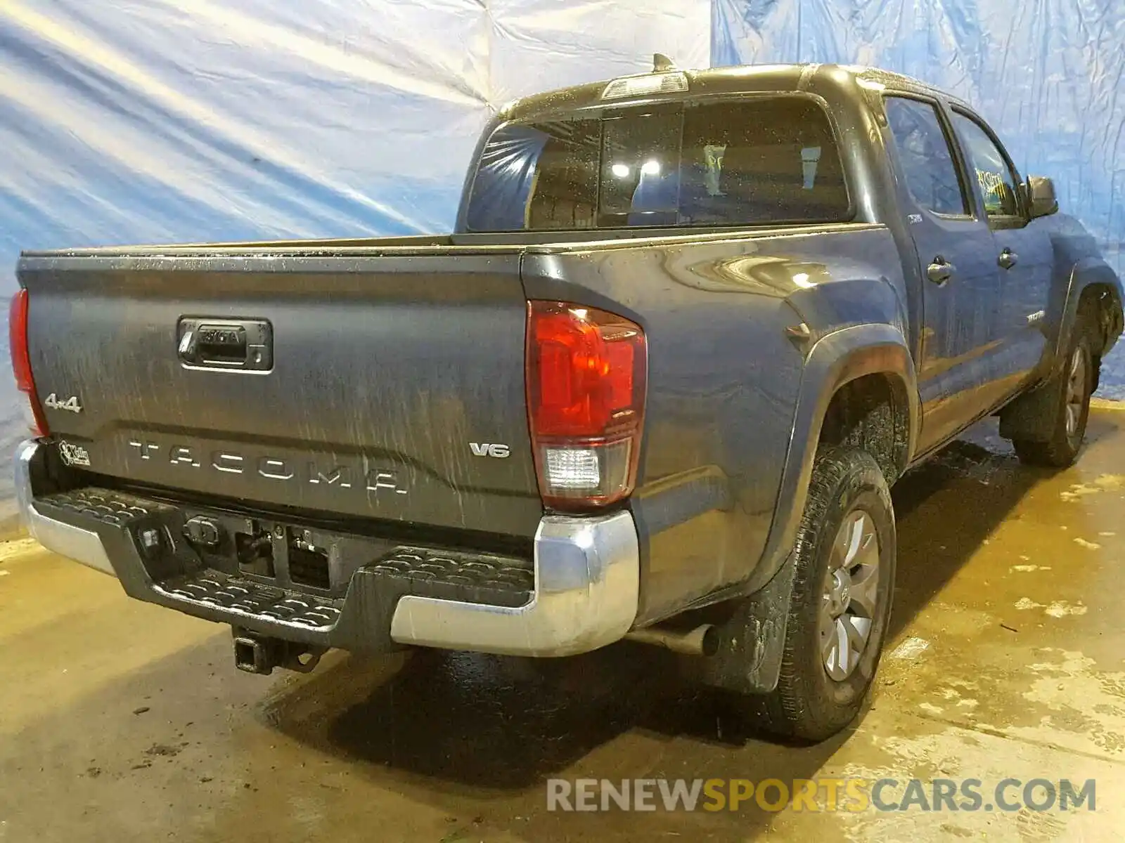 4 Photograph of a damaged car 3TMCZ5AN9KM191542 TOYOTA TACOMA DOU 2019