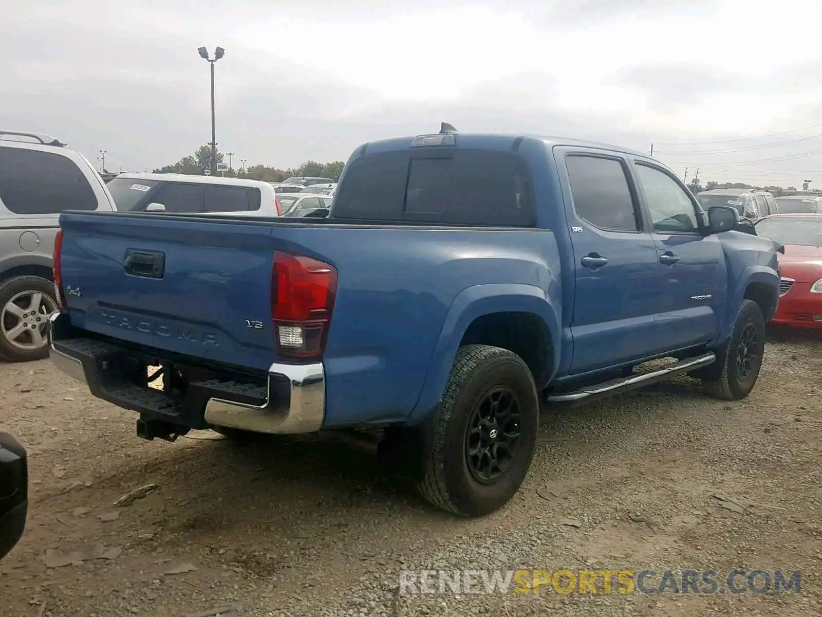 4 Photograph of a damaged car 3TMCZ5AN9KM202796 TOYOTA TACOMA DOU 2019