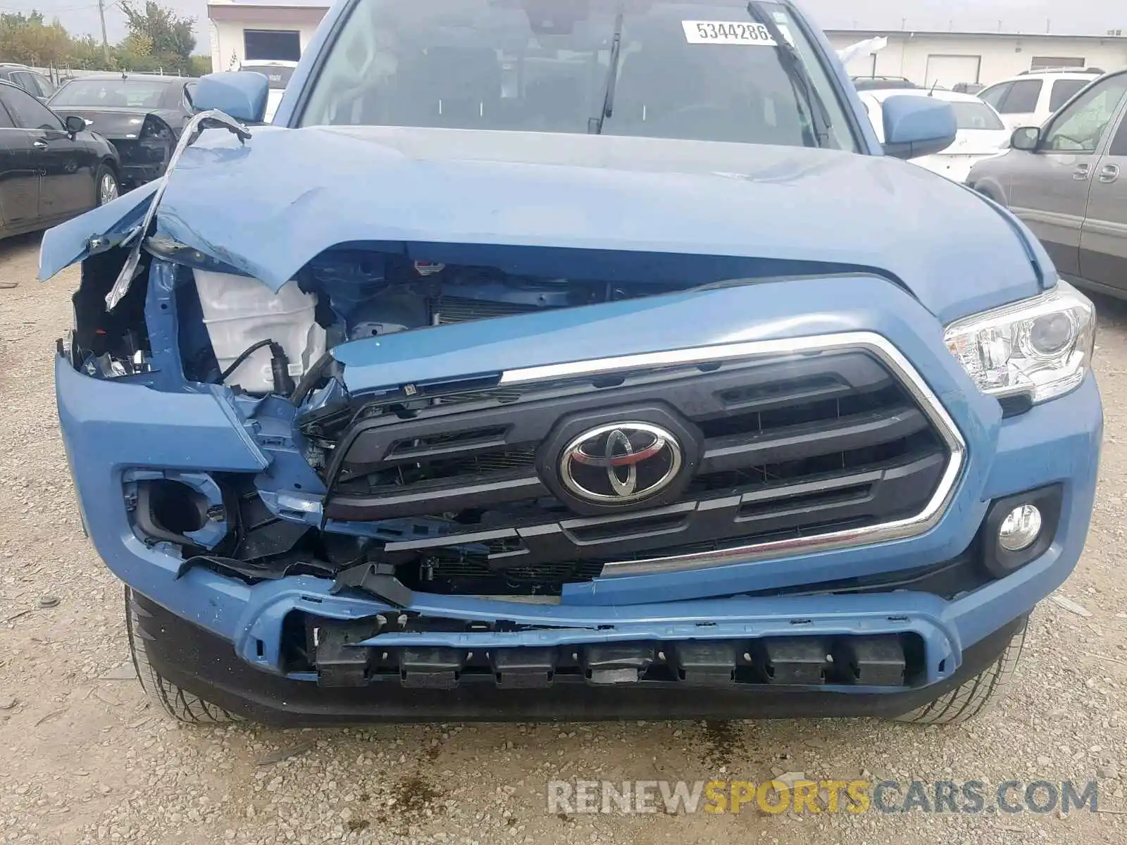 7 Photograph of a damaged car 3TMCZ5AN9KM202796 TOYOTA TACOMA DOU 2019