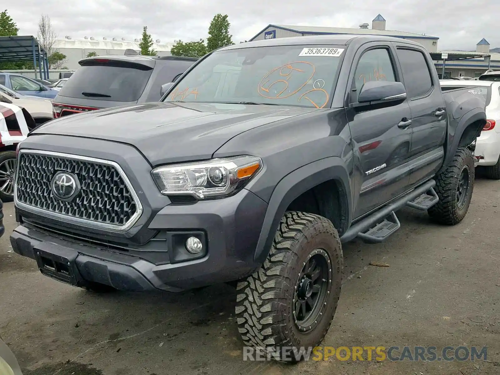 2 Photograph of a damaged car 3TMCZ5AN9KM206251 TOYOTA TACOMA DOU 2019