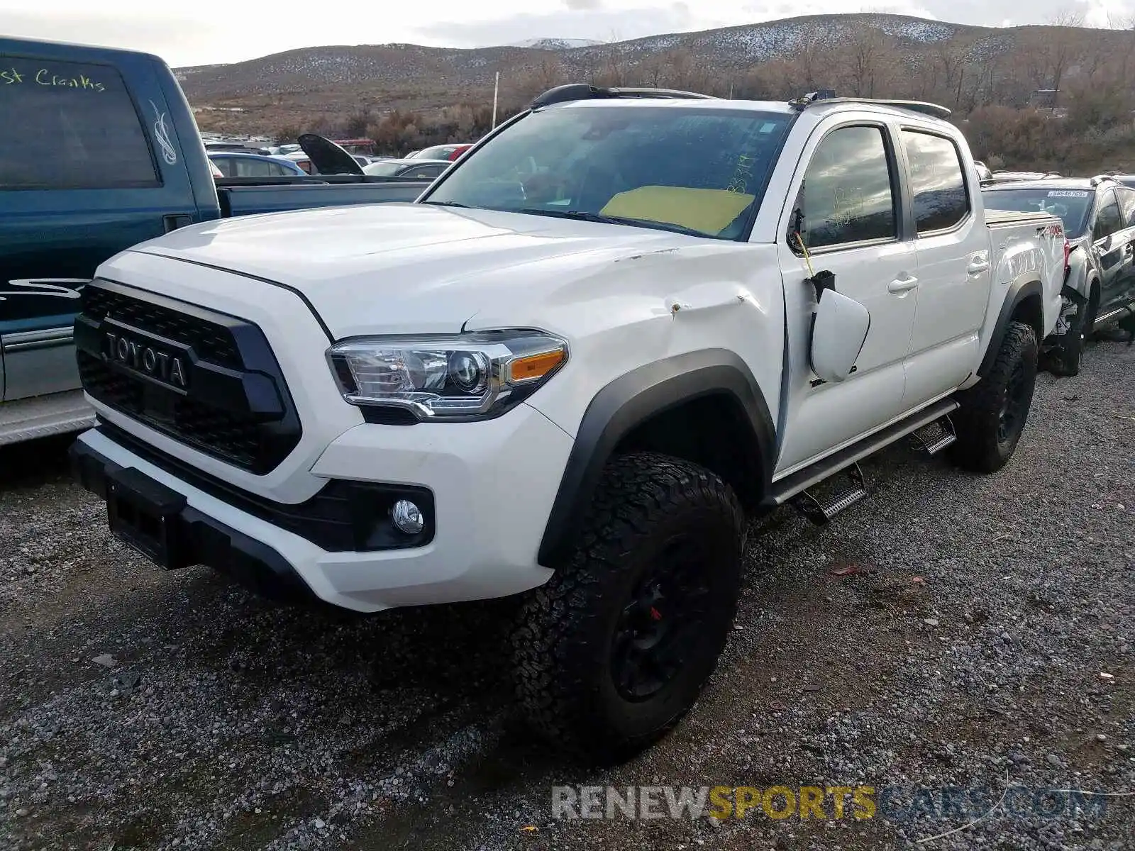 2 Photograph of a damaged car 3TMCZ5AN9KM218691 TOYOTA TACOMA DOU 2019