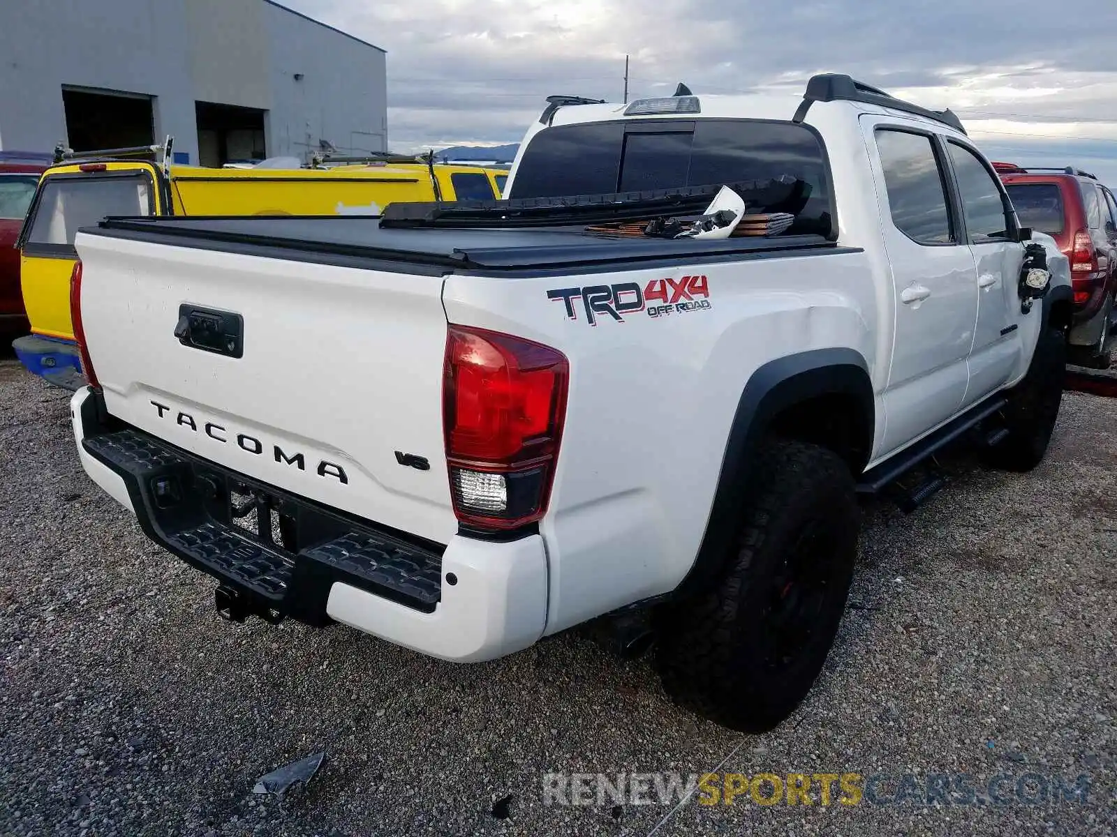 4 Photograph of a damaged car 3TMCZ5AN9KM218691 TOYOTA TACOMA DOU 2019