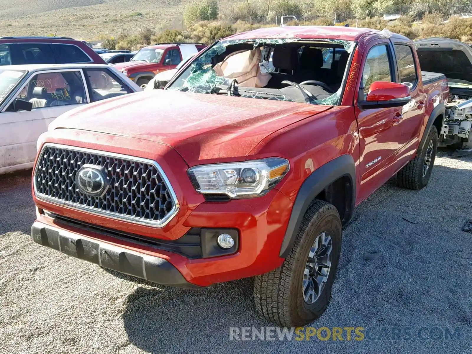 2 Photograph of a damaged car 3TMCZ5AN9KM219842 TOYOTA TACOMA DOU 2019