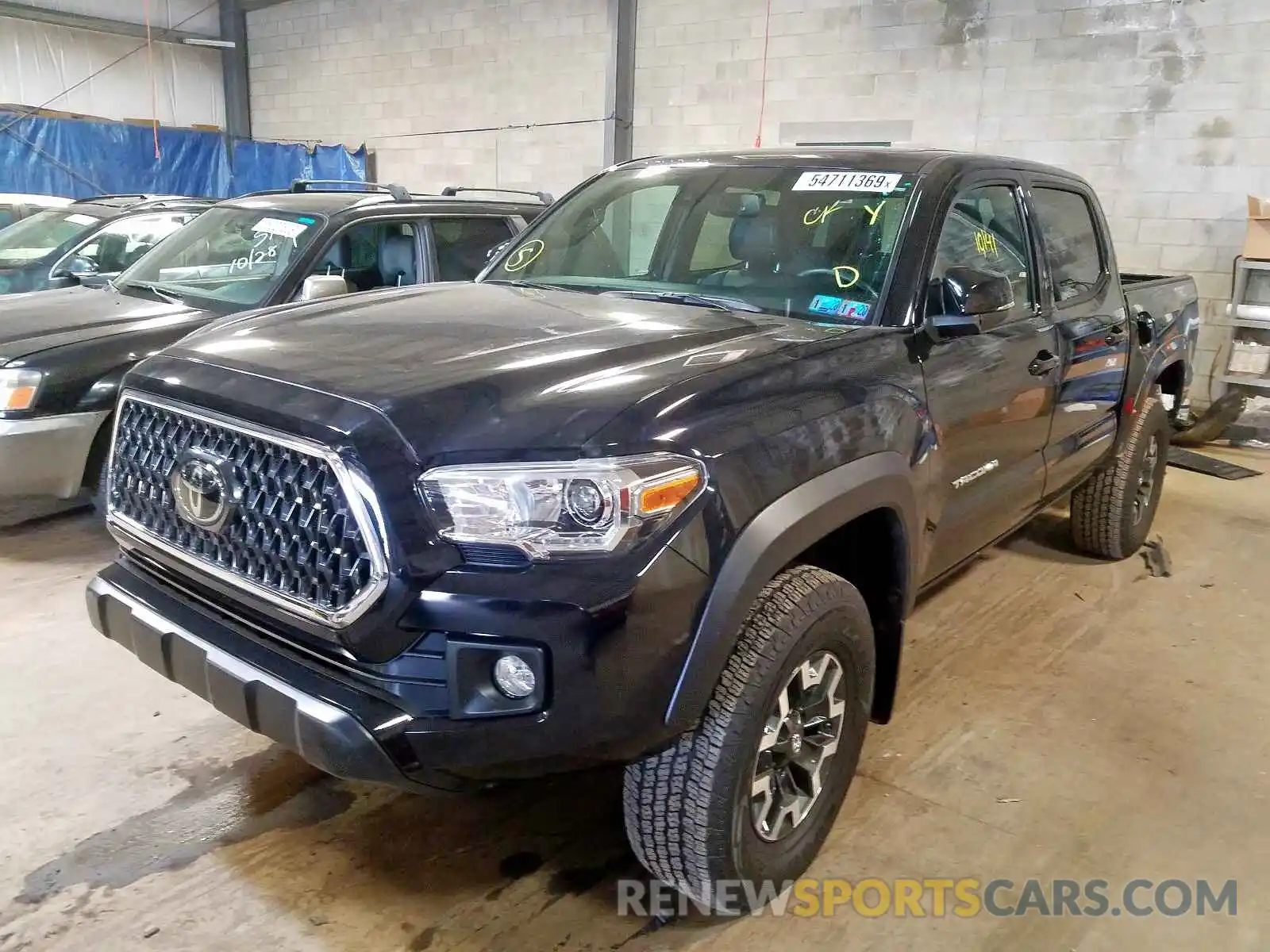 2 Photograph of a damaged car 3TMCZ5AN9KM221736 TOYOTA TACOMA DOU 2019