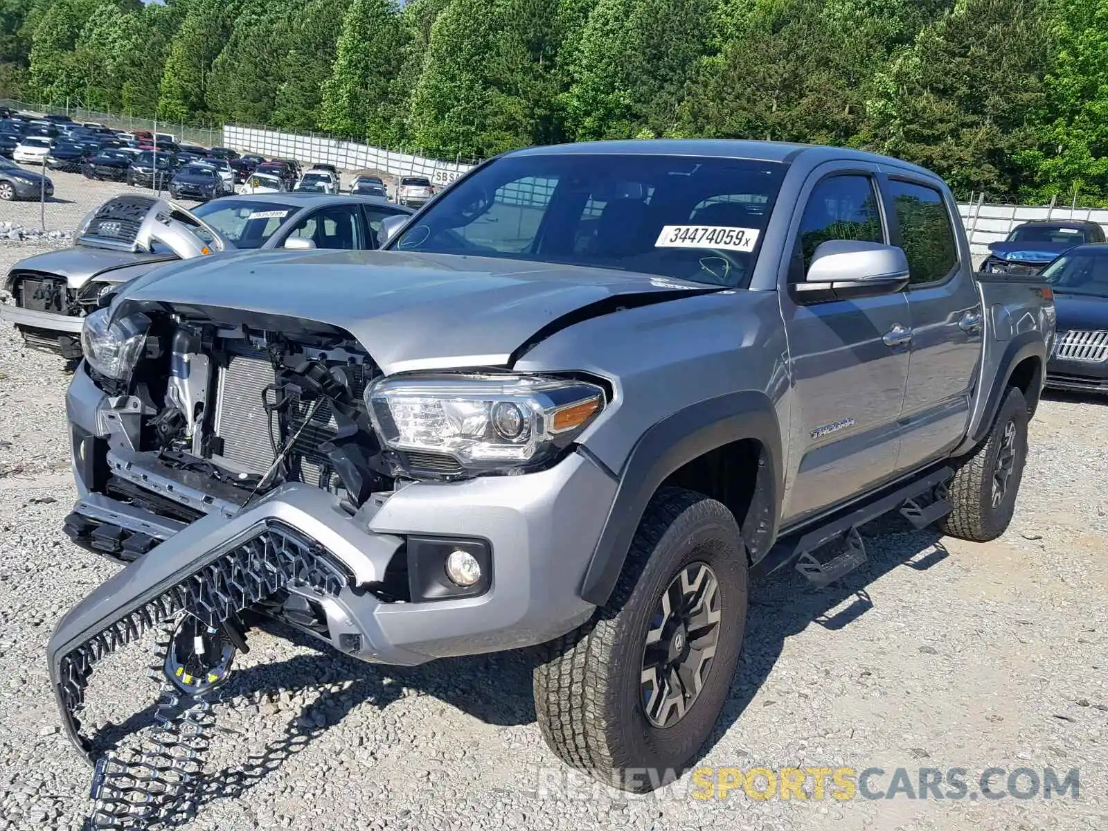 2 Photograph of a damaged car 3TMCZ5ANXKM199035 TOYOTA TACOMA DOU 2019