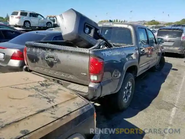 4 Photograph of a damaged car 3TMCZ5ANXKM257760 TOYOTA TACOMA DOU 2019