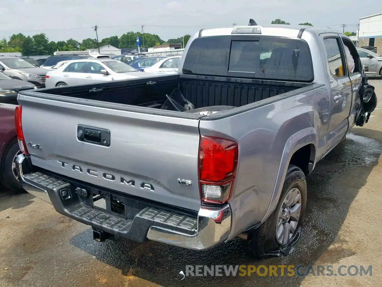 4 Photograph of a damaged car 3TMDZ5BN0KM059112 TOYOTA TACOMA DOU 2019