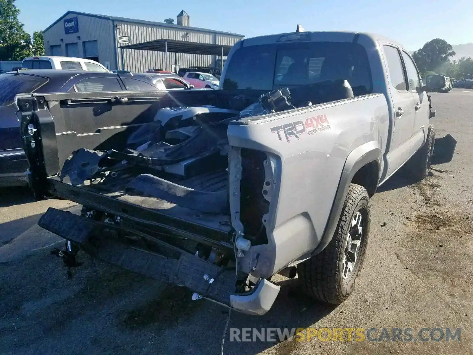 4 Photograph of a damaged car 3TMDZ5BN0KM061880 TOYOTA TACOMA DOU 2019