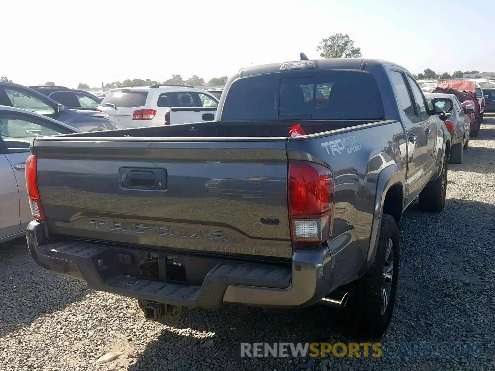 4 Photograph of a damaged car 3TMDZ5BN0KM070563 TOYOTA TACOMA DOU 2019