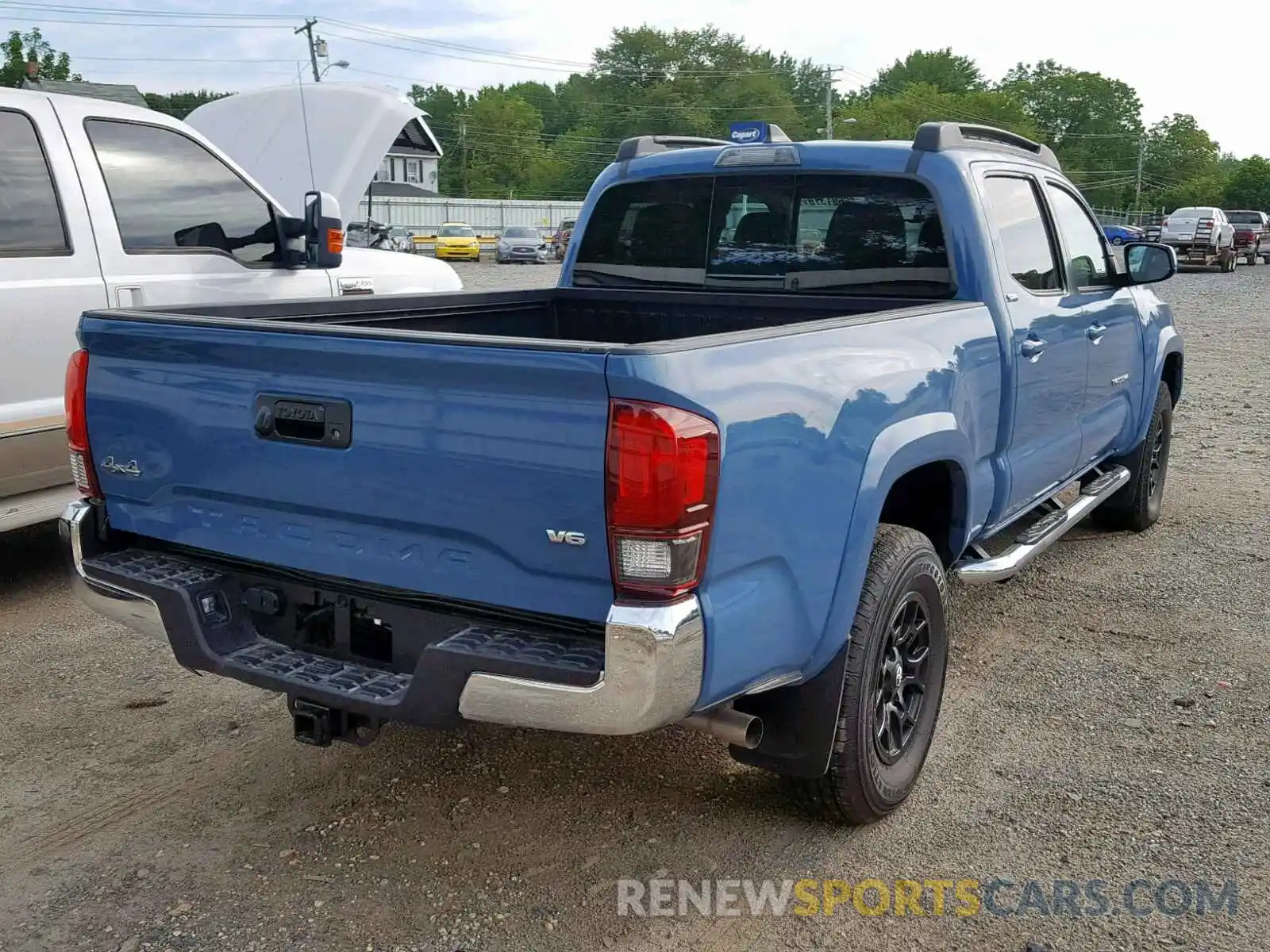 4 Photograph of a damaged car 3TMDZ5BN1KM058762 TOYOTA TACOMA DOU 2019