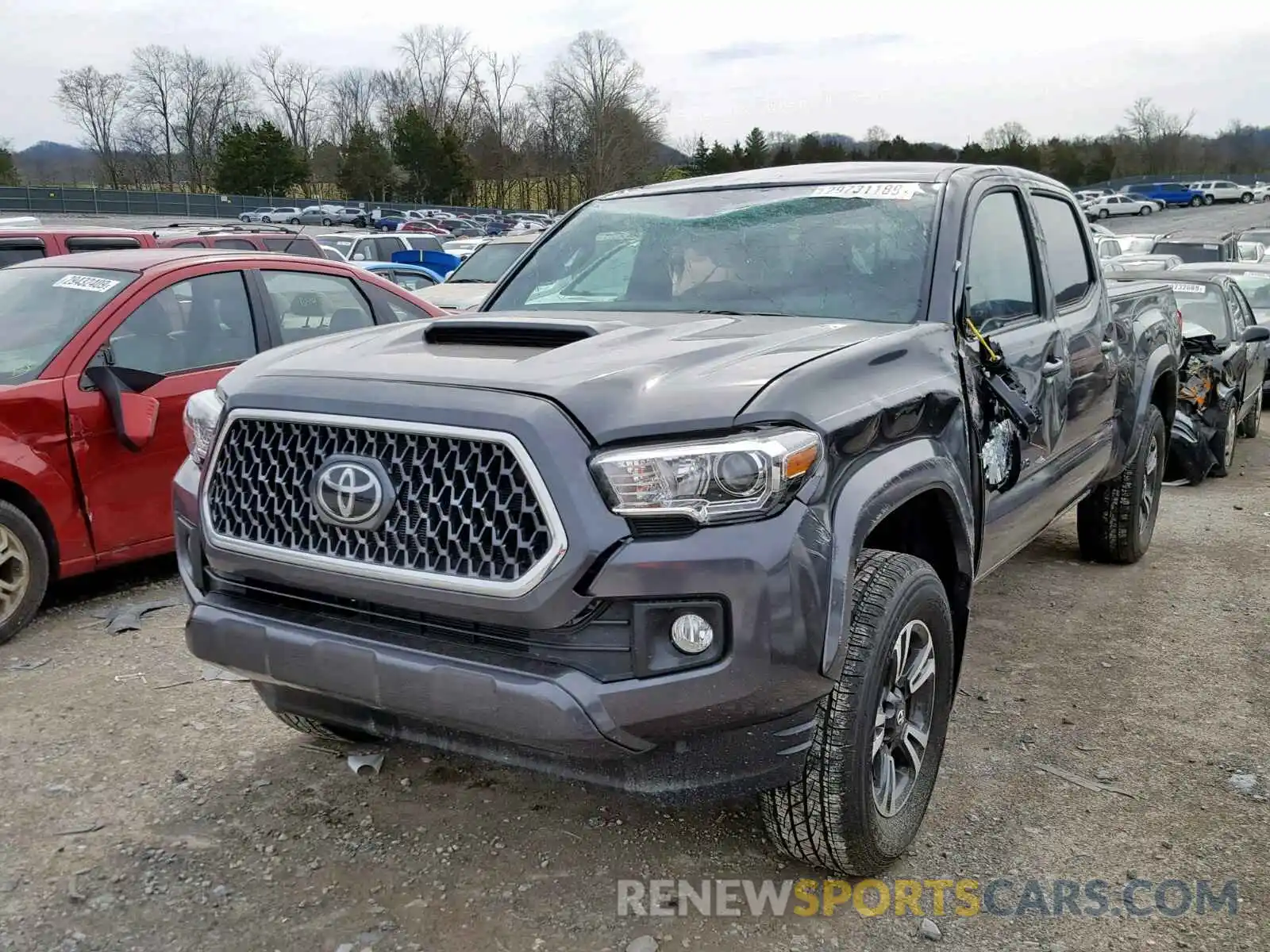 2 Photograph of a damaged car 3TMDZ5BN1KM059622 TOYOTA TACOMA DOU 2019