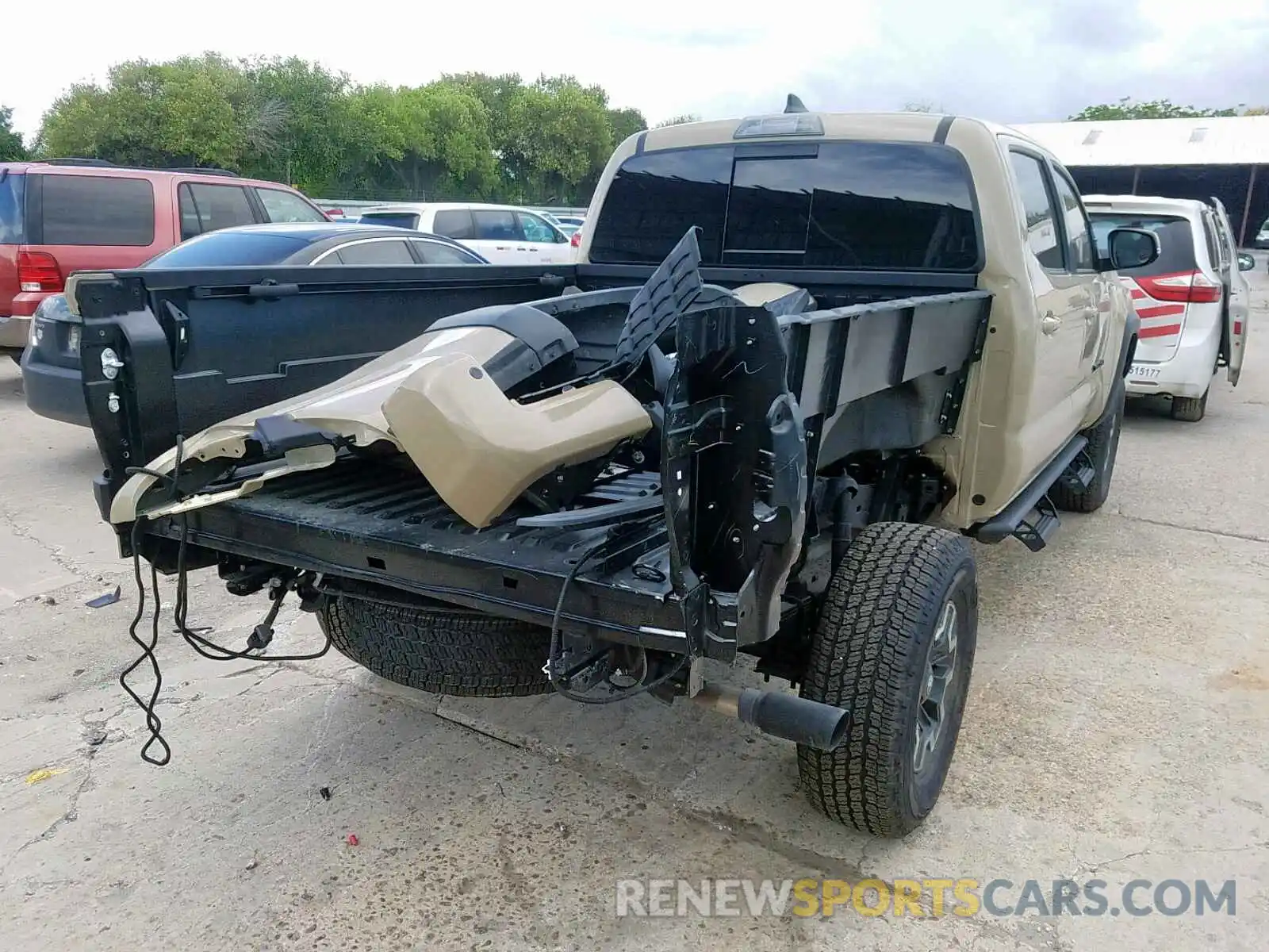 4 Photograph of a damaged car 3TMDZ5BN1KM072306 TOYOTA TACOMA DOU 2019