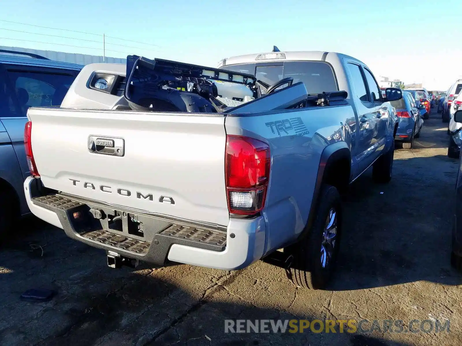 4 Photograph of a damaged car 3TMDZ5BN2KM061010 TOYOTA TACOMA DOU 2019