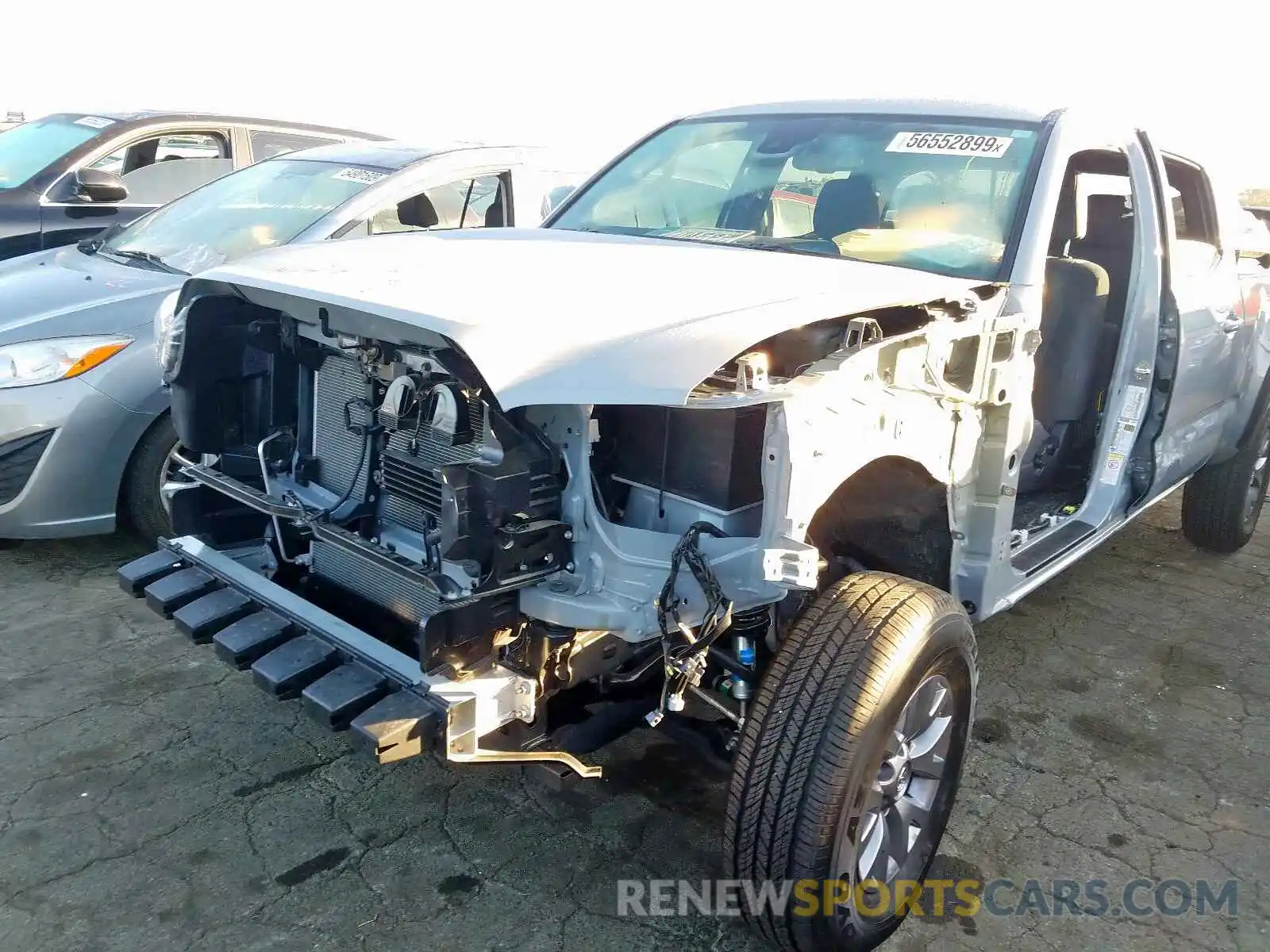 9 Photograph of a damaged car 3TMDZ5BN2KM061010 TOYOTA TACOMA DOU 2019