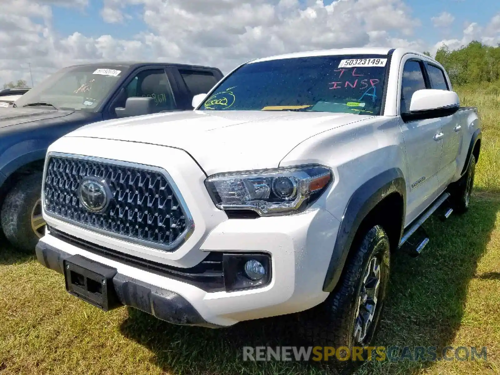 2 Photograph of a damaged car 3TMDZ5BN2KM076364 TOYOTA TACOMA DOU 2019