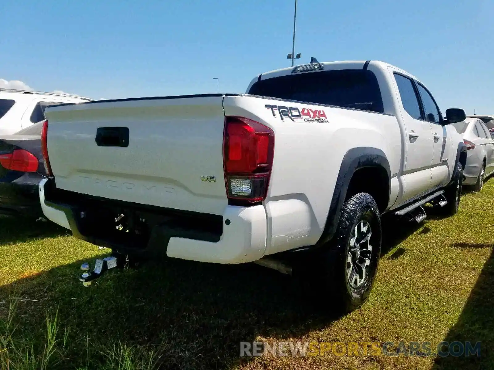 4 Photograph of a damaged car 3TMDZ5BN2KM076364 TOYOTA TACOMA DOU 2019