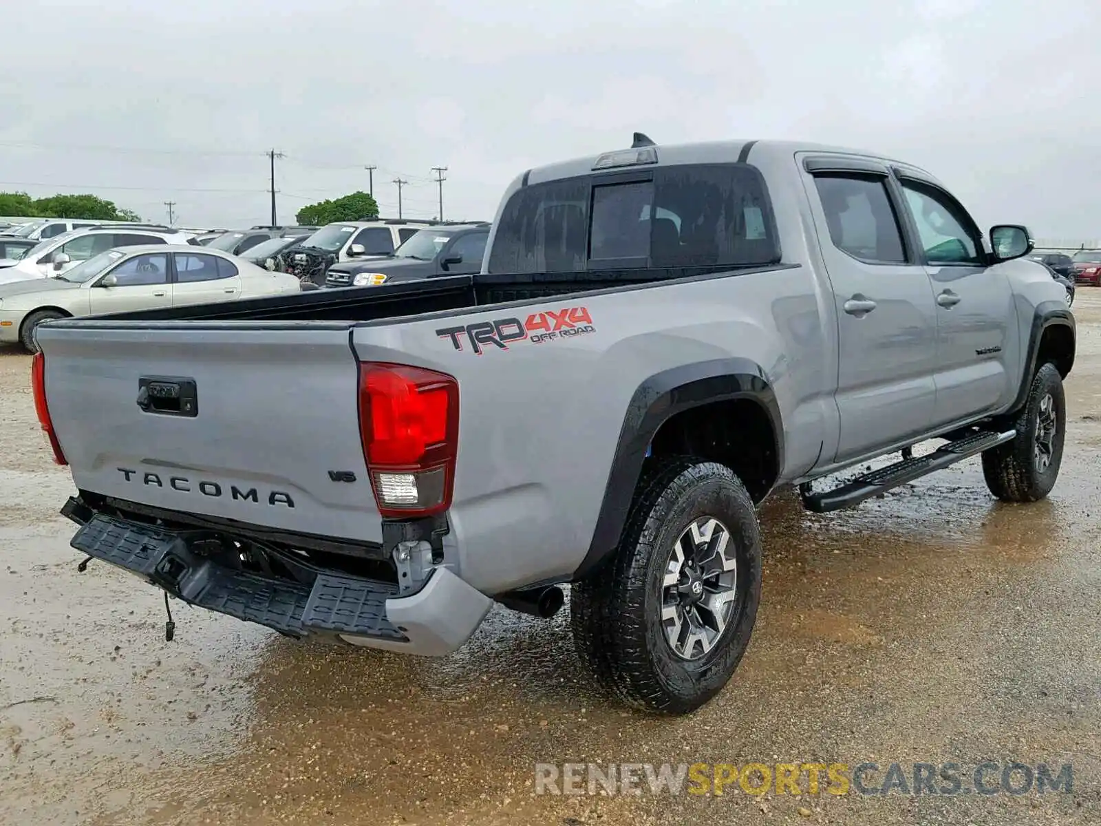 4 Photograph of a damaged car 3TMDZ5BN3KM057841 TOYOTA TACOMA DOU 2019