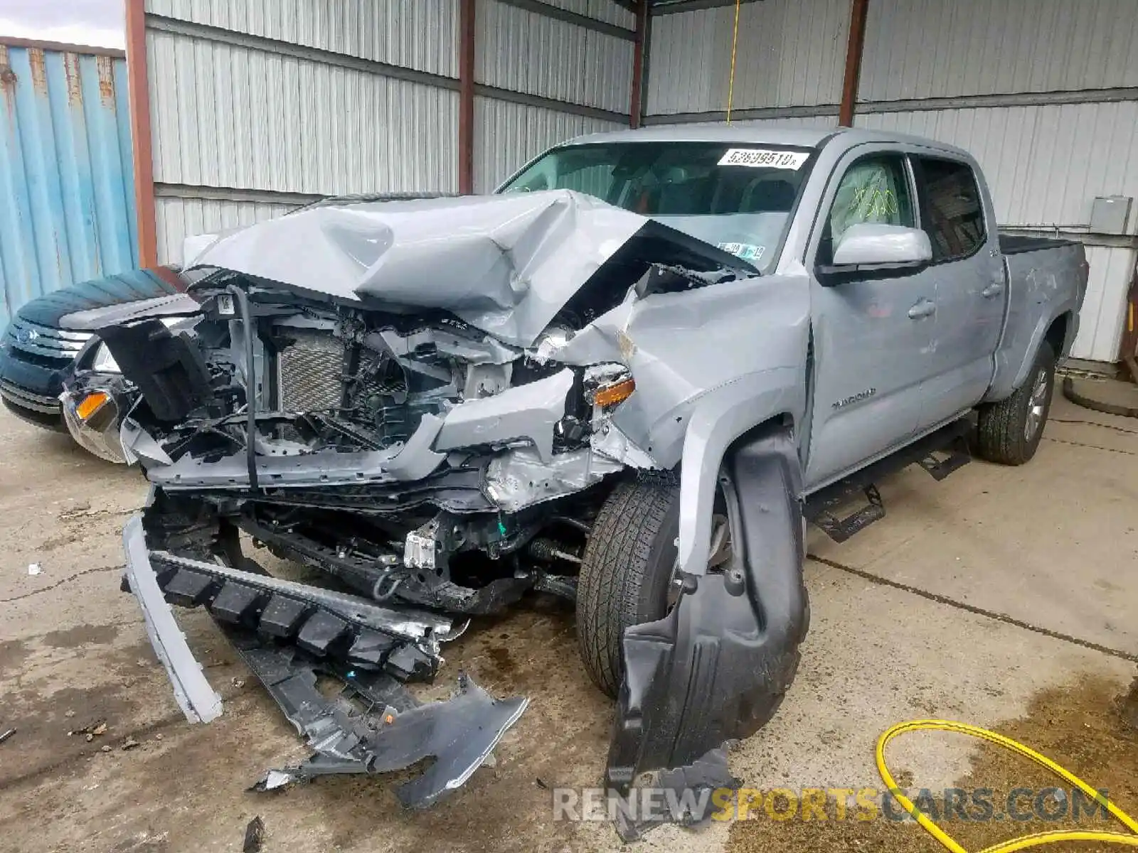 2 Photograph of a damaged car 3TMDZ5BN4KM056536 TOYOTA TACOMA DOU 2019