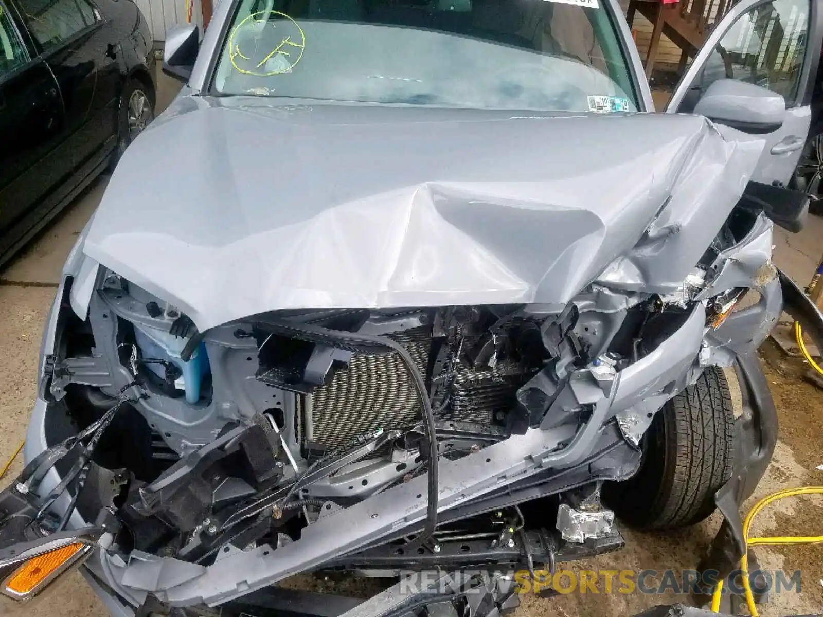 7 Photograph of a damaged car 3TMDZ5BN4KM056536 TOYOTA TACOMA DOU 2019