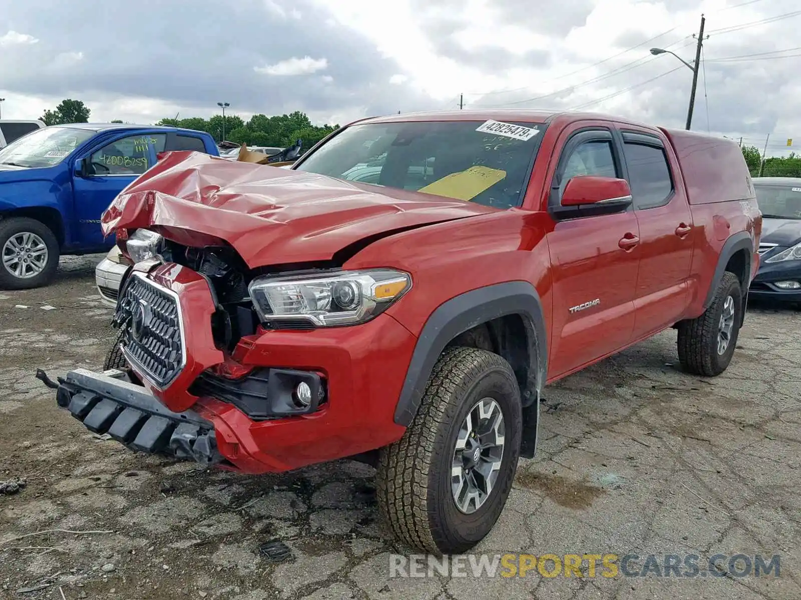 2 Photograph of a damaged car 3TMDZ5BN4KM056942 TOYOTA TACOMA DOU 2019